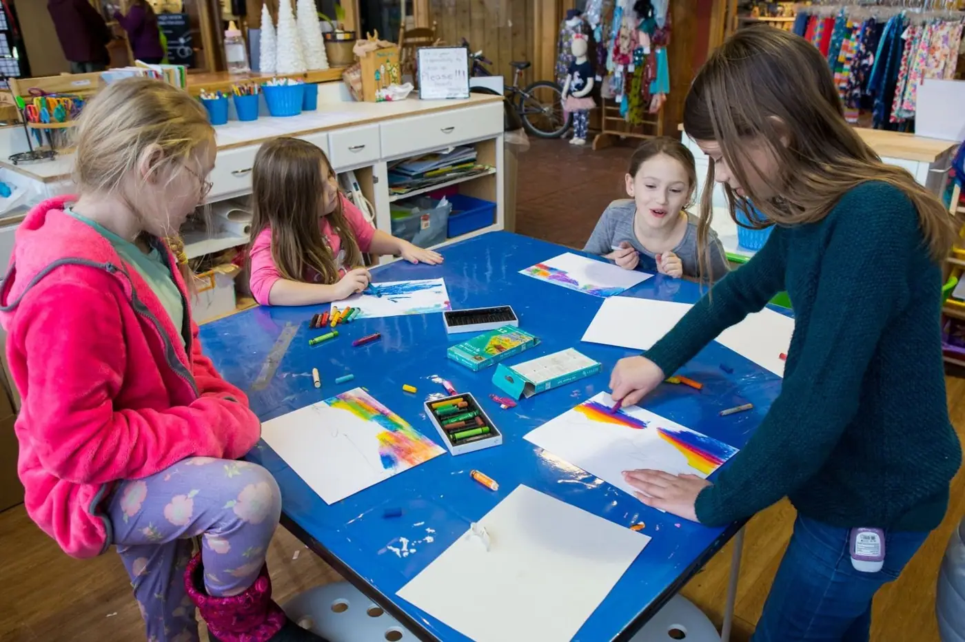 Two girls making art at Creations